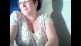 Granny Flaunts Her Assets On Webcam